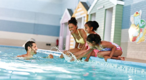 Family by the pool at Hoseasons resort 